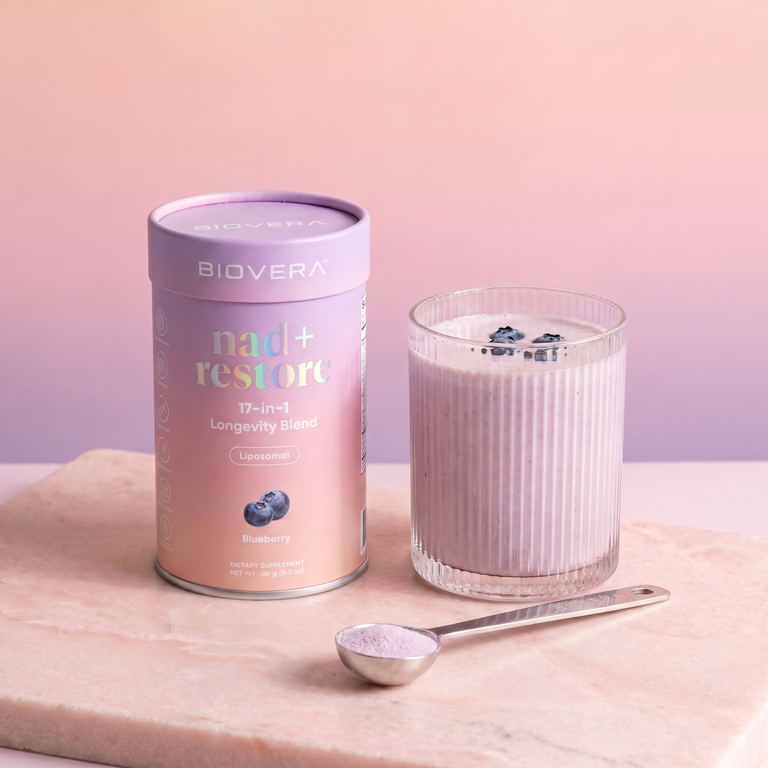 nad+ restore jar with a blueberry drink and BIOVERA spoon
