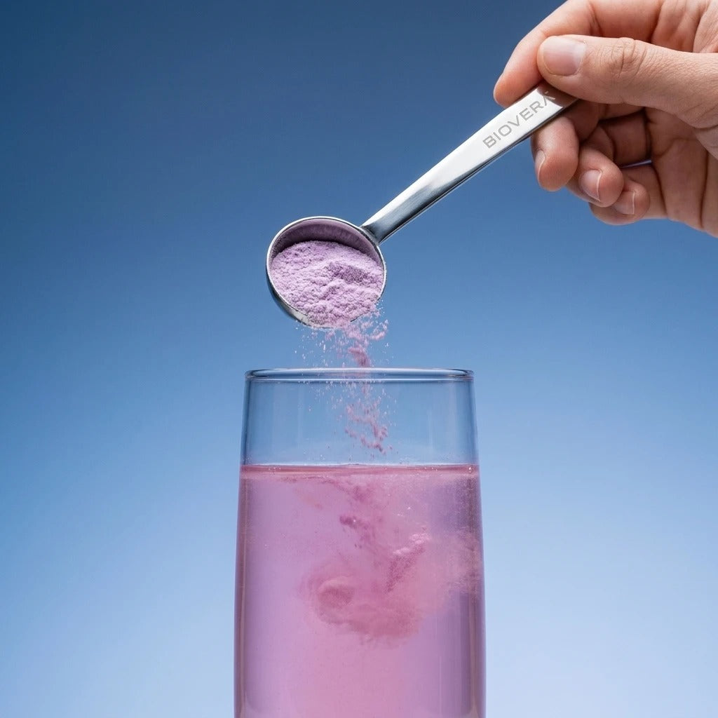 BIOVERA scoop pouring nad+ restore into water